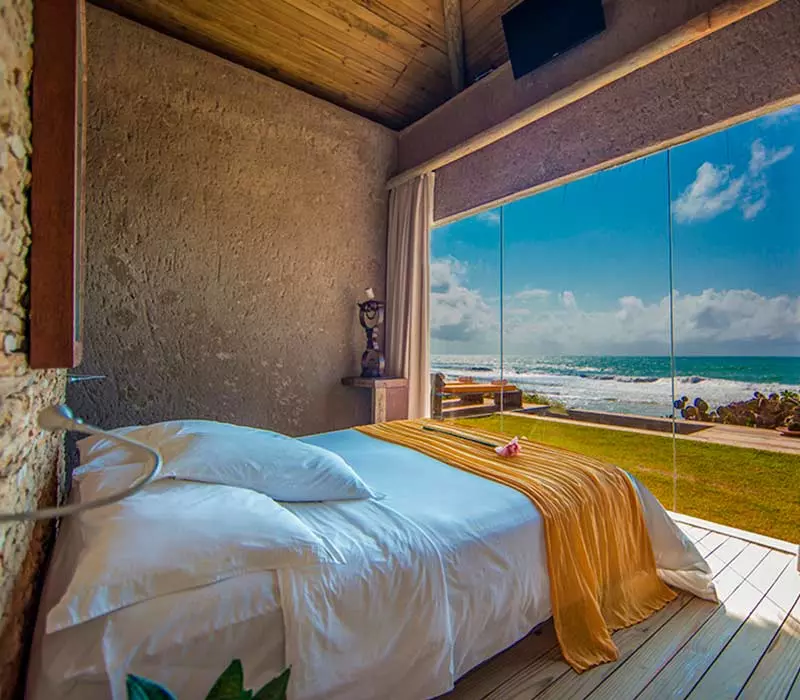 O Kenoa Resort tem suítes com vistas incríveis. 
